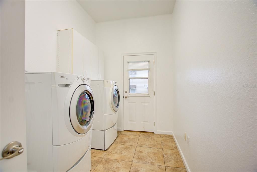 Laundry room off RV port.  washer/dryer included with purchase