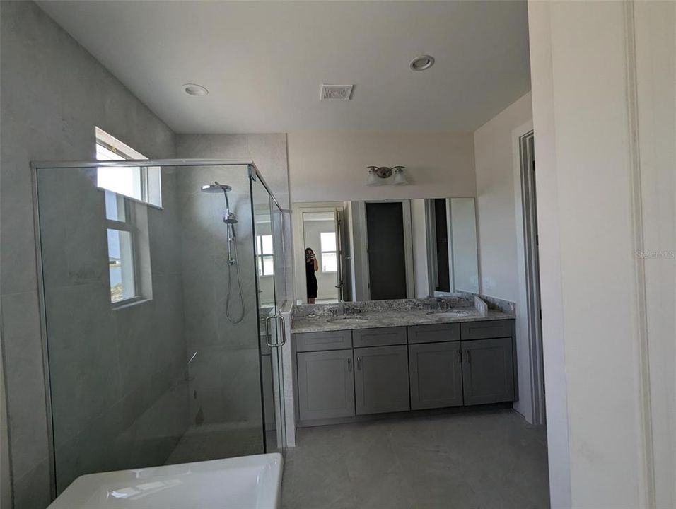 Primary bathroom with free-standing tub