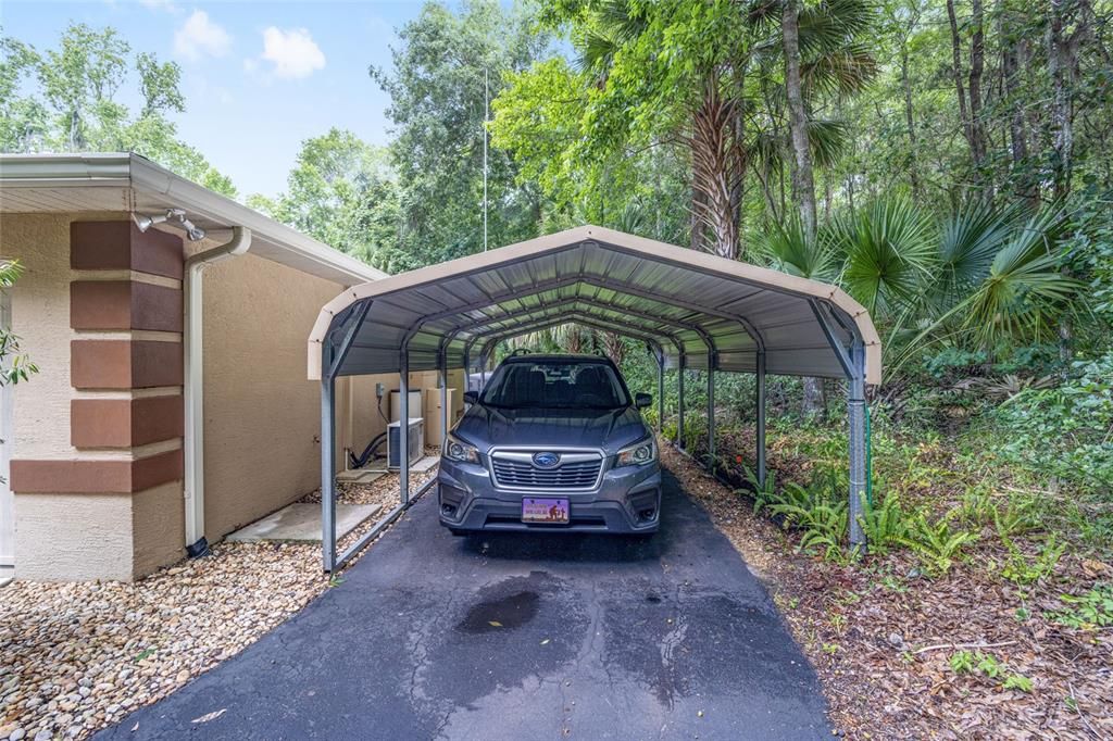 Carport, it is always nice to have extra covered parking