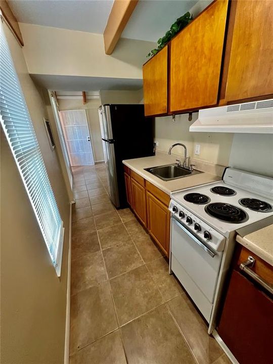 kitchen feautures newer cabinets