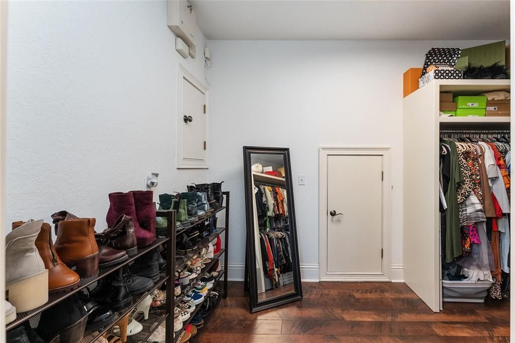 Two large walk in closets, also a very large walk in attic storage space, and built in safe.