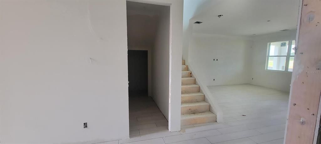 Stairs and storage beneath