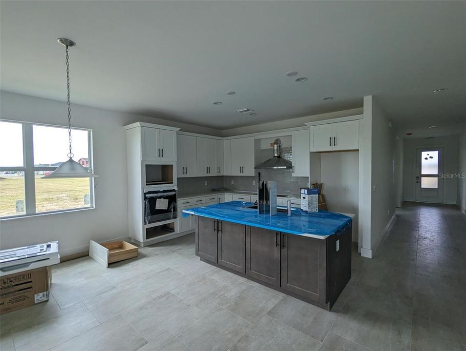 Kitchen area with upgraded soft-close cabinets and drawers