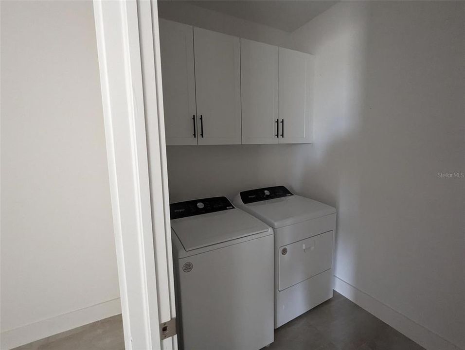 Laundry room with upgraded soft-close cabinets