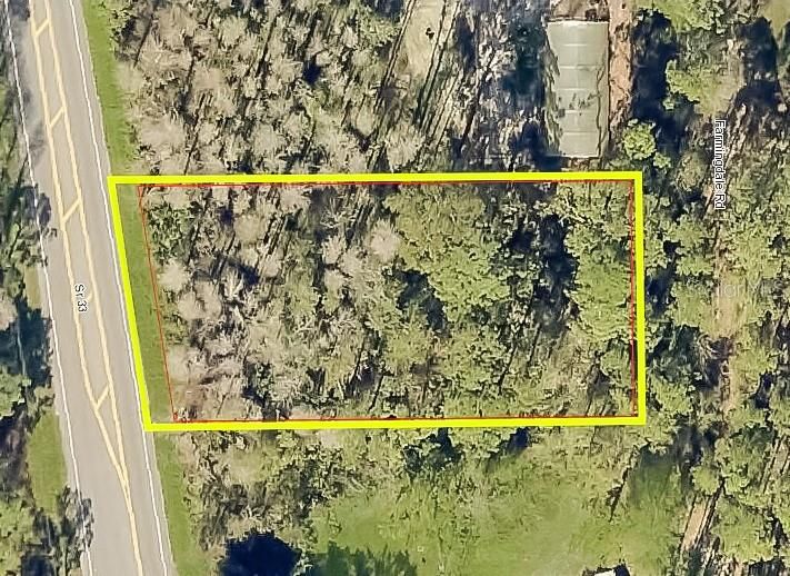 Property Fronts State Road 33 near the Intersection with CR 474. From the Main Road on SR 33 You Will Build Your Driveway to the Back of the Property where Your New Home Will Be Shaded by Longleaf Pine and other Tall Trees!