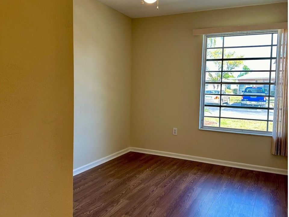 Bedroom one beckons with natural light, offering a warm start to your day in your new haven.