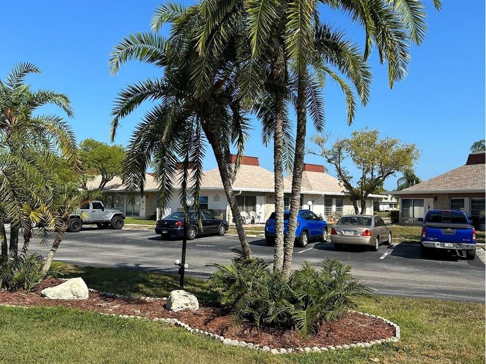 Welcome to your own slice of paradise! Step onto your cozy front porch and immerse yourself in Florida-friendly landscaping, where vibrant flowers and local wildlife await your enjoyment.