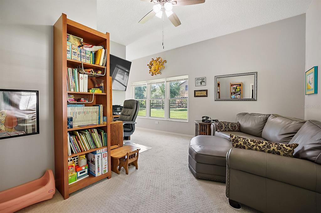 Seating area in the In-law suite has 2 exterior entrances, HVAC, Septic, and full bath and plumbed for kitchen