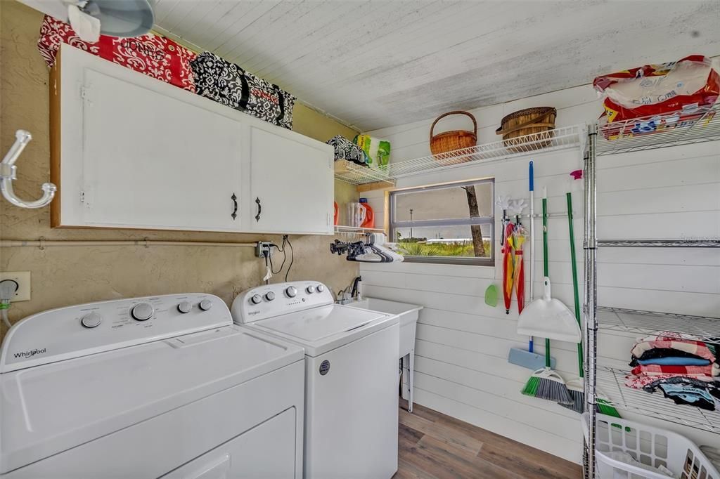 Laundry room located under cover off patio