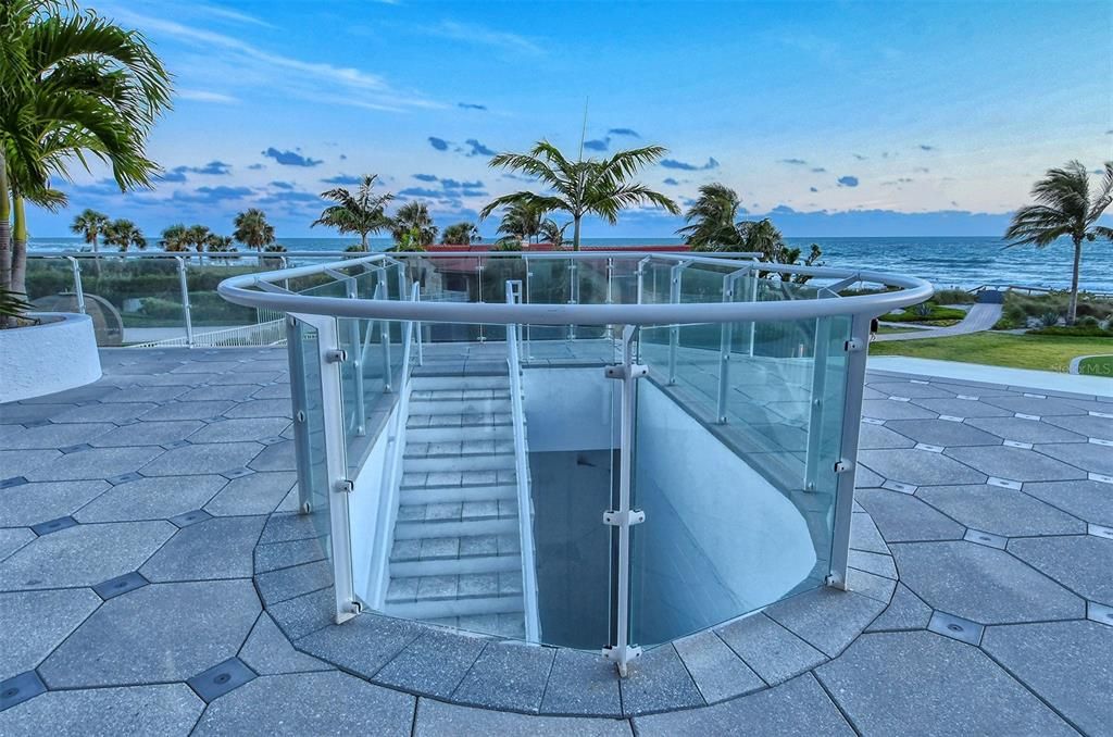 Stairs to Garage and Community Pool Area