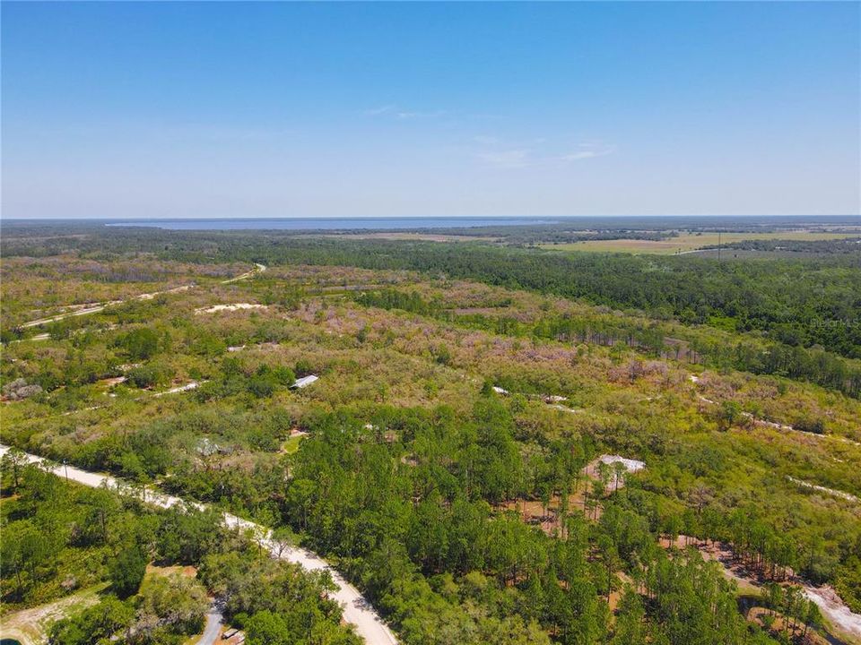 Aerial- NW property lake in distance