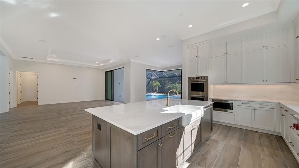 Kitchen view to family room and dining room