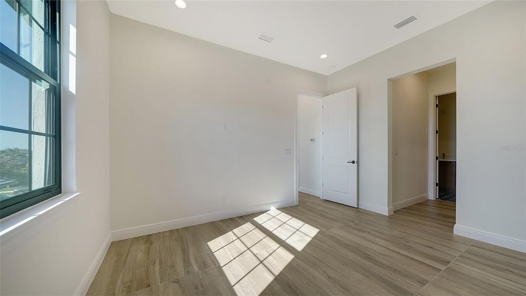 Upstairs Bedroom 4 with ensuite bath