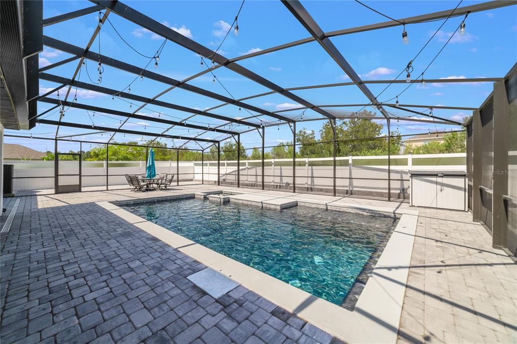 The new smart pool is fully automated and controlled via an app, has a salt-water filter, deck jets and a bubbler, an upgraded interior finish and the pool and spa are both heated!