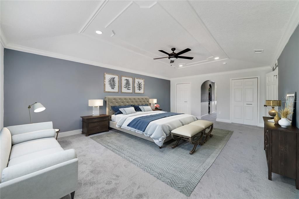 All of the bedrooms are a great size but your primary suite is a true retreat delivering a decorative ceiling, DUAL WALK-IN CLOSETS, and through an arched doorway a beautiful private bath! Virtually Staged.