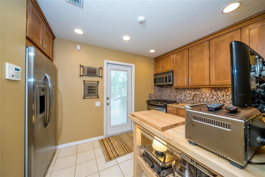 In-law kitchen/pool entertainment or convert to 5th bedroom