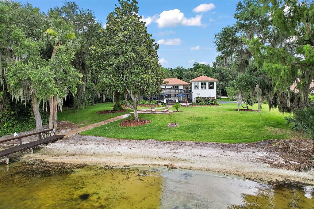 Your own your beach on Lake Dora!