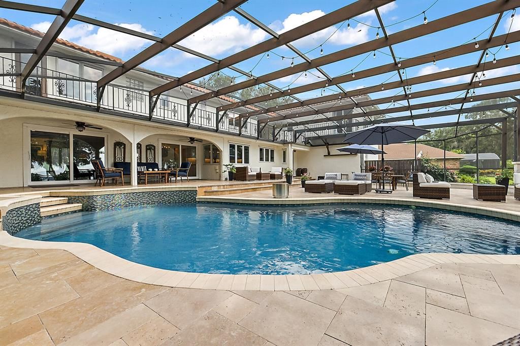 Note the second floor balcony overlooking sparkling pool deck (and Lake views beyond!)