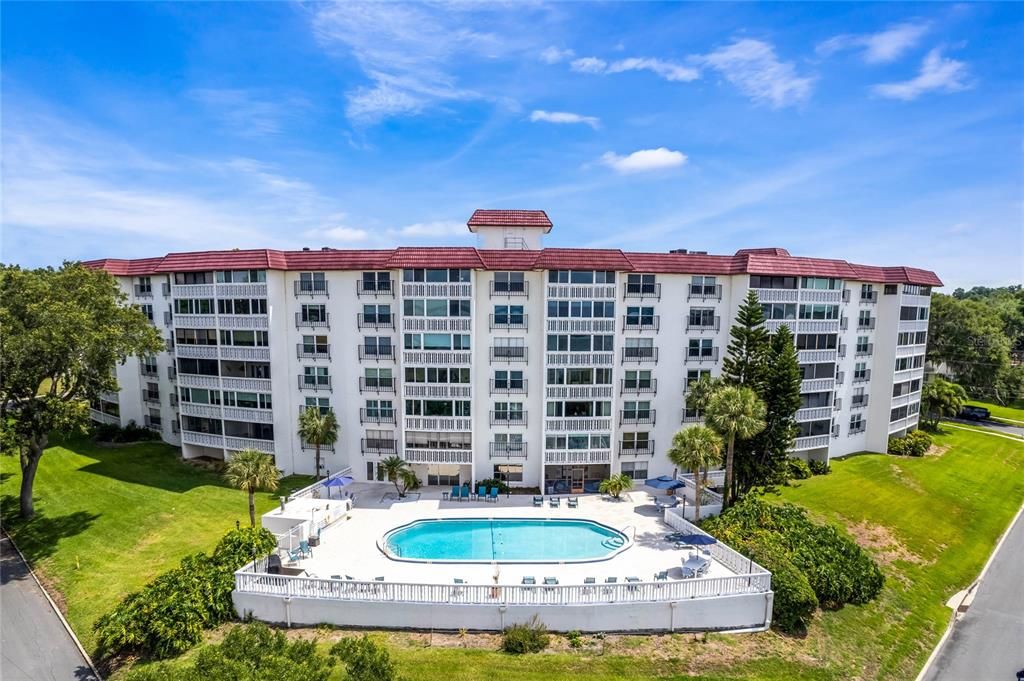 Heated pool with unit above center right fifth floor