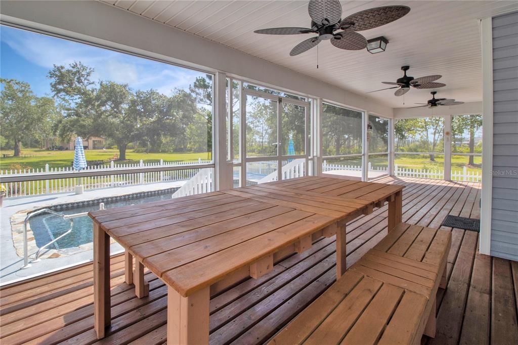 Newly screened porch overlooking pool, acreage, barn