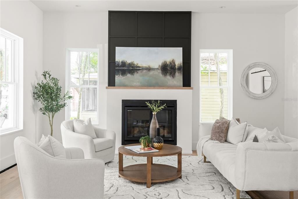 Gas fireplace with custom wood design element over mantle