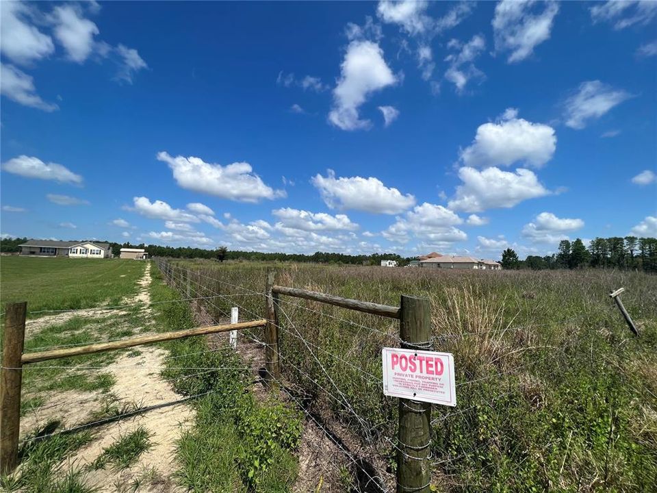 This is a shot from front edge of adjacent property that may be sold in addition to subject property, lot size acreage of .88 acres.