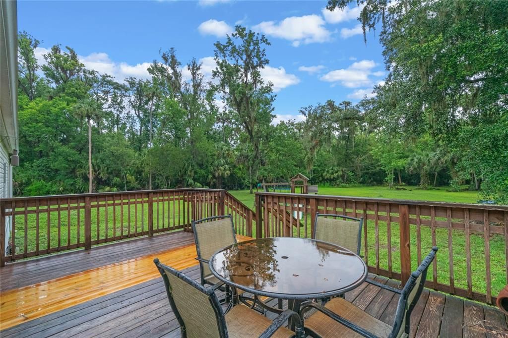 Plenty of room for dinner on the deck overlooking the tranquil property.