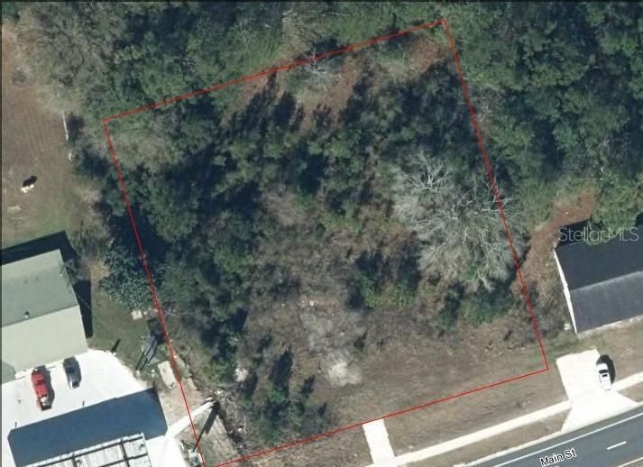 commercial lot for sale with 199 foot of frontage on main st