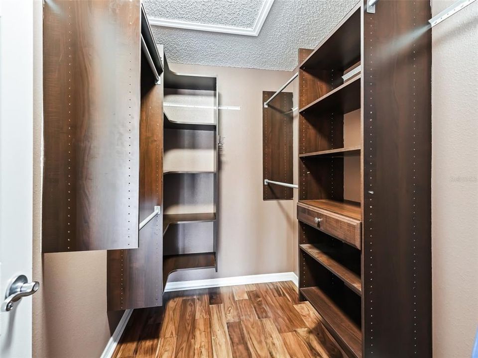 A Beautiful and Functional Closet System in the Master Closet