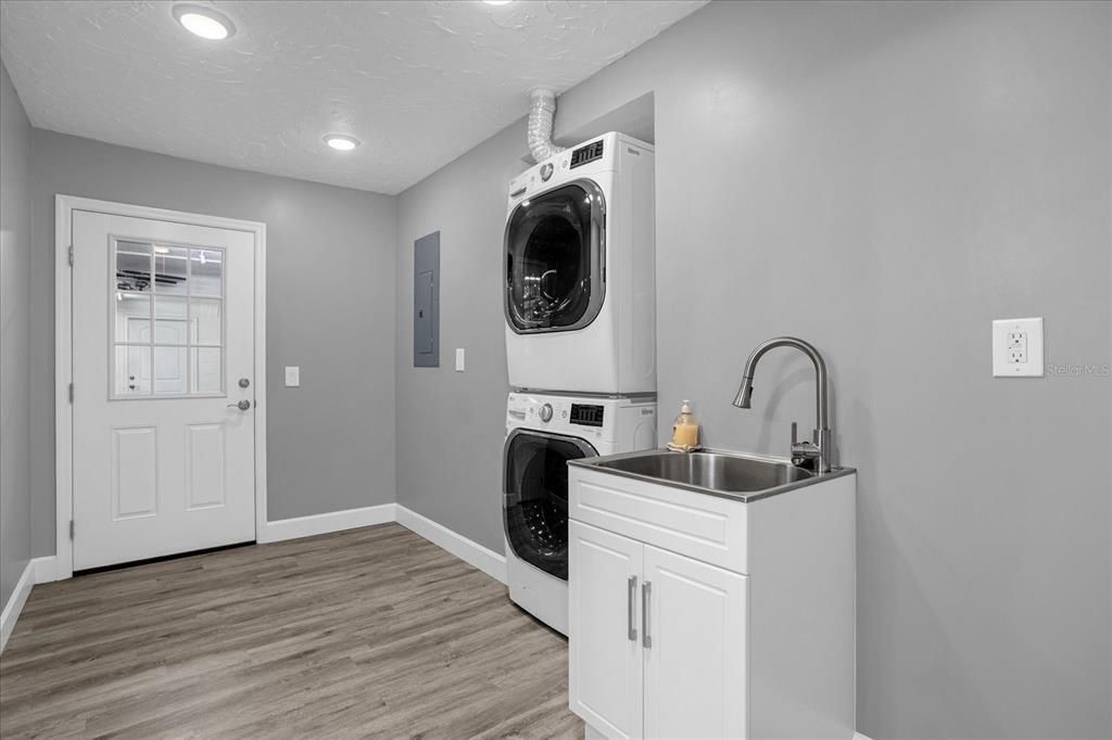 Laundry area on Lower Level next to garage