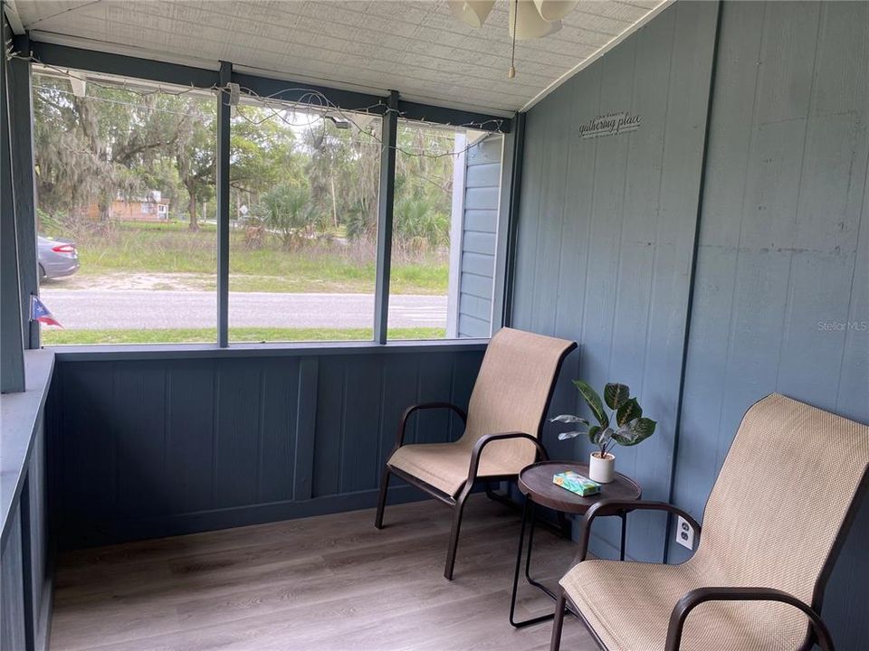 Plenty of room in the back screened in porch for quiet evening talks or room to PARTY!.