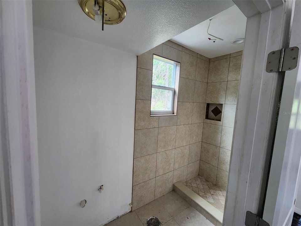 bathroom inside detached bldg