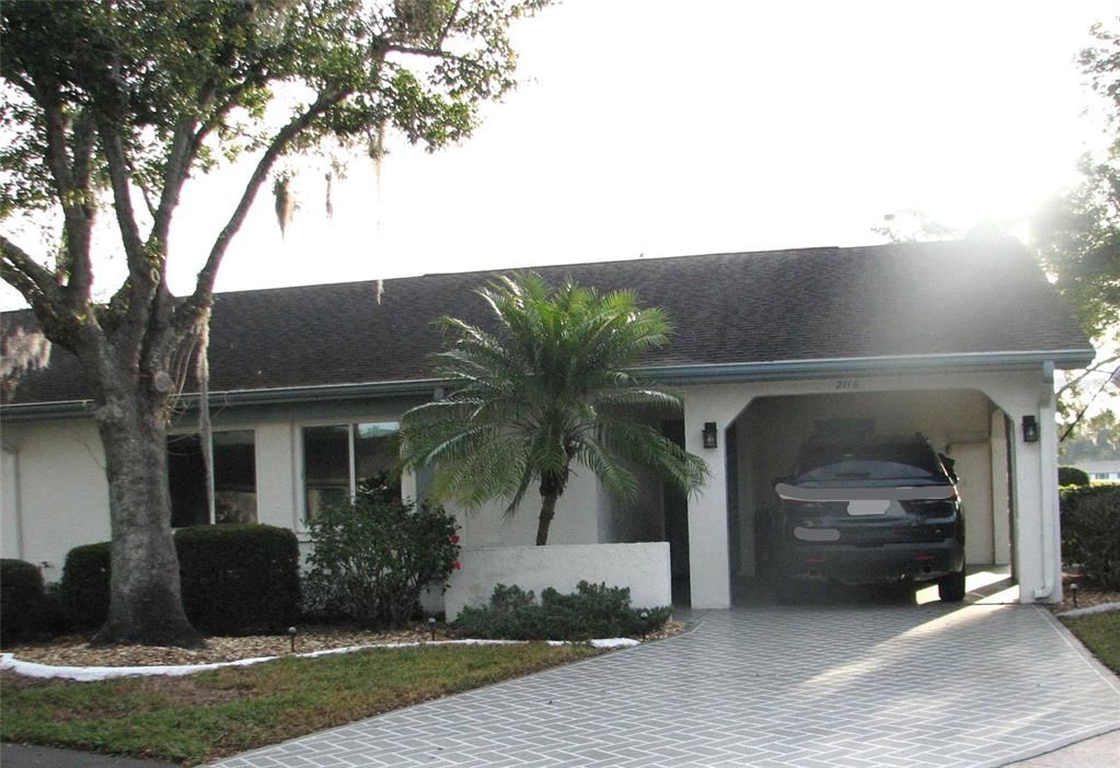 carport and driveway with this one