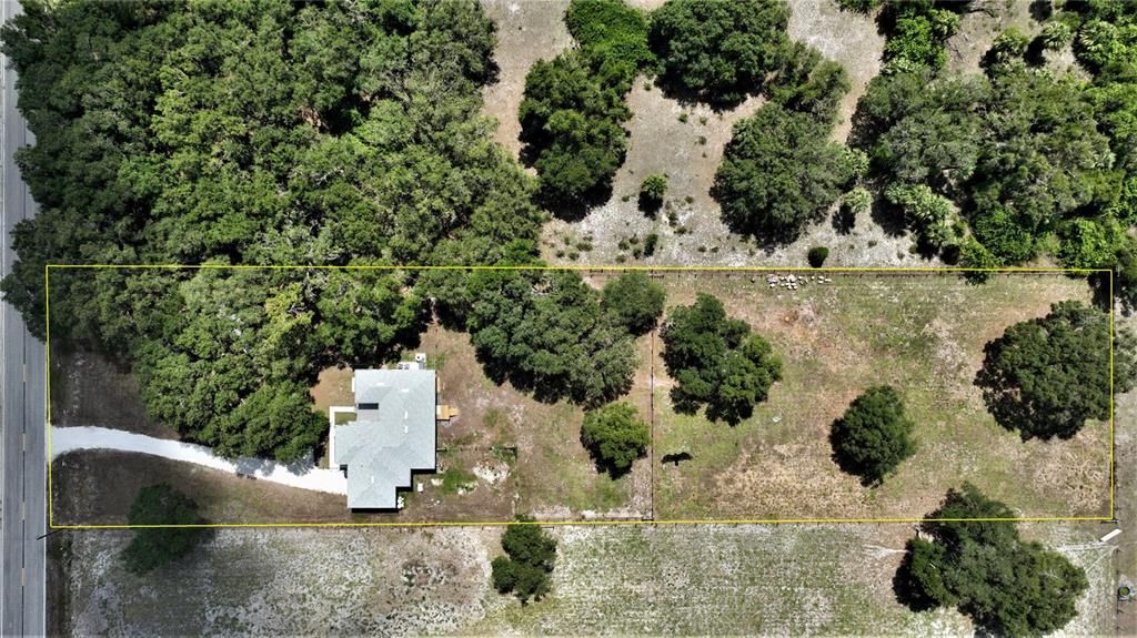 Aerial view of home on over two acres