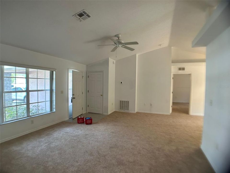 Large family room with high ceilings...brand new carpet throughout