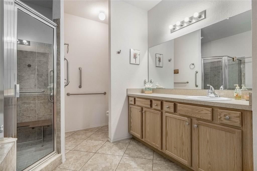 Master Bathroom features a Walk in Tiled Shower & Comfort Height Toilet