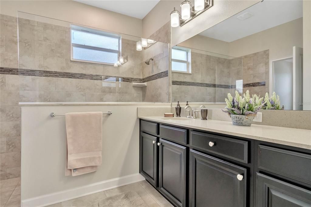Master Bathroom offers a large vanity with dual sinks