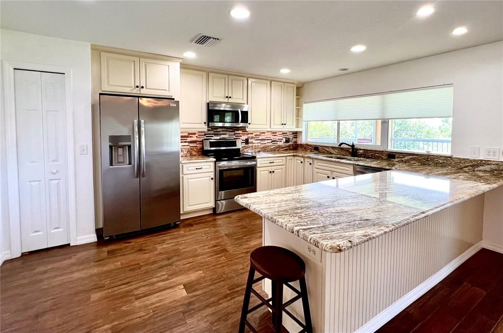 2nd home kitchen w/ Kraft maid cabinets & granite countertops
