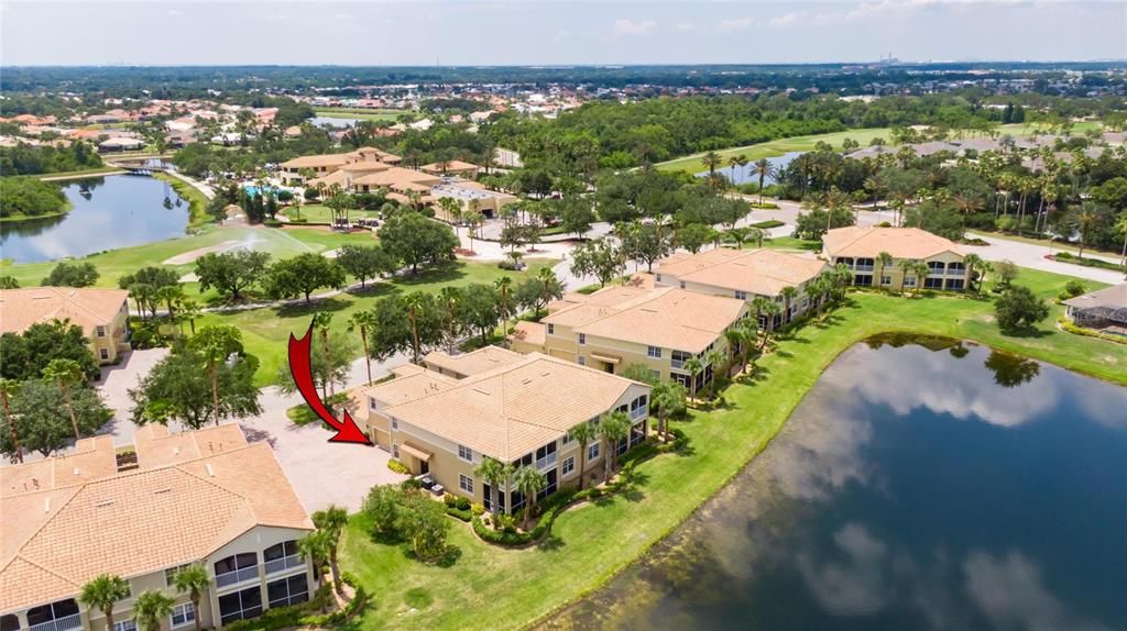 An aerial shot shows the uniqueness of this condo's position. Pointed out with the red arrow, it has a wonderful water view with Renaissance Club directly across the street.