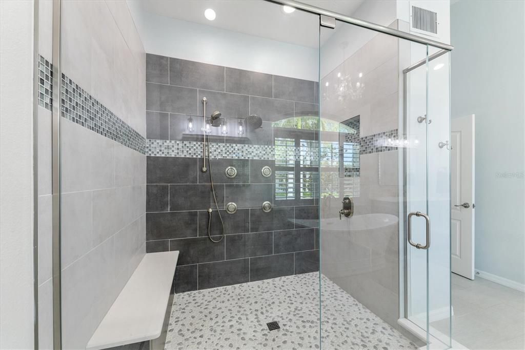 Large Master Shower with custom seat and Multi shower heads