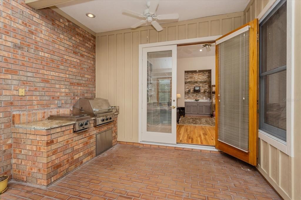 Outdoor custom built  Barbeque area with adjoining gas-burning stove - convenient to Kitchen and Family Room.