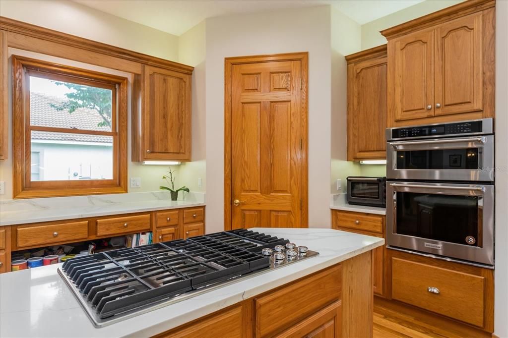 Gas cooking!  Oven with convection setting. Microwave - and large walk-in Pantry