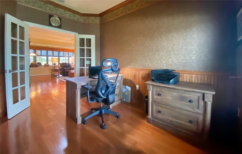 Den Office with beautiful hard wood floors