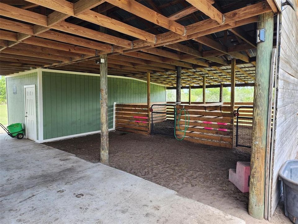 Feed and tack rooms to the left.