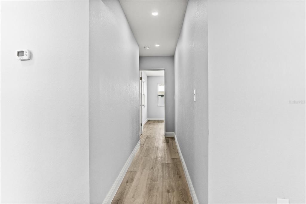 Hallway to private master suite