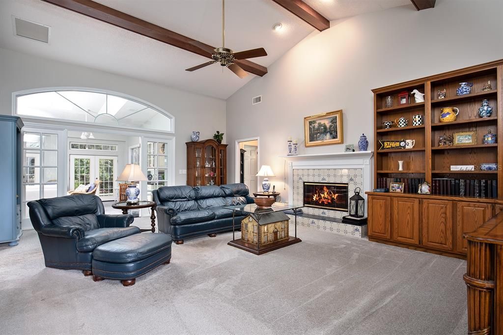 Family Room with decorative wood beams