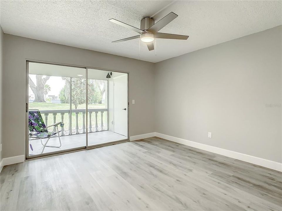 Main Living space luxury vinyl wood-look flooring that flows throughout the home