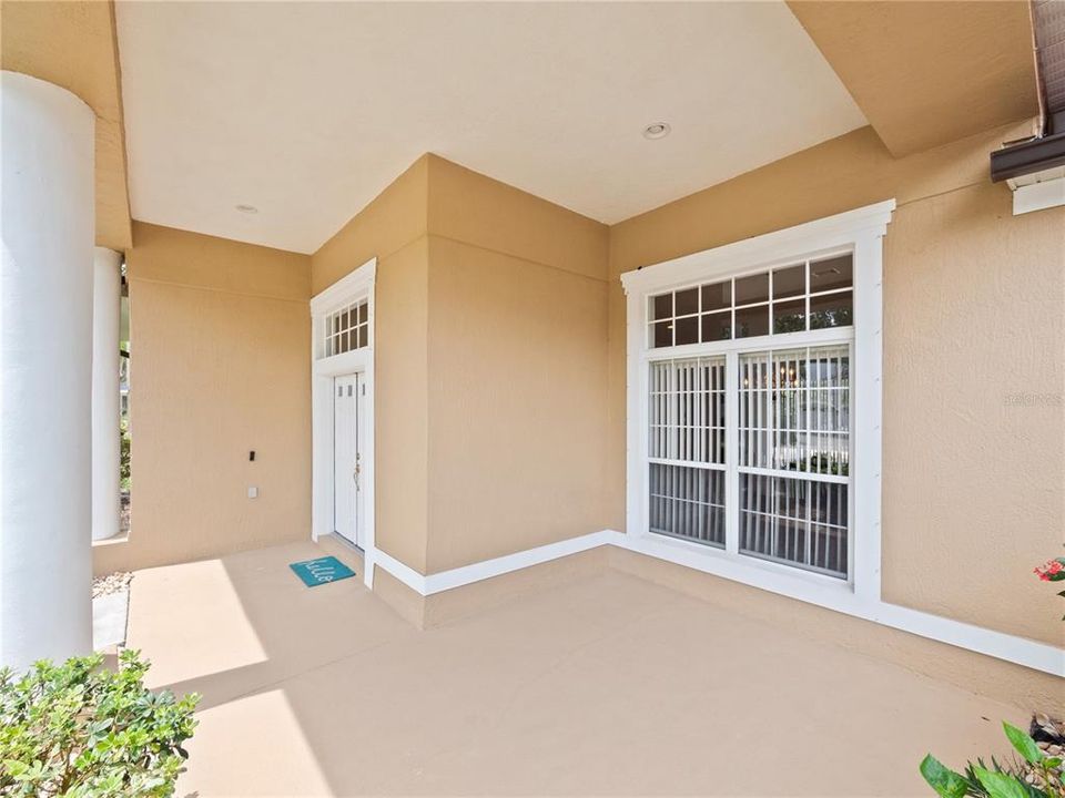 Fabulous front porch with room for rocking chairs. Enjoy a cool drink in the evenings.