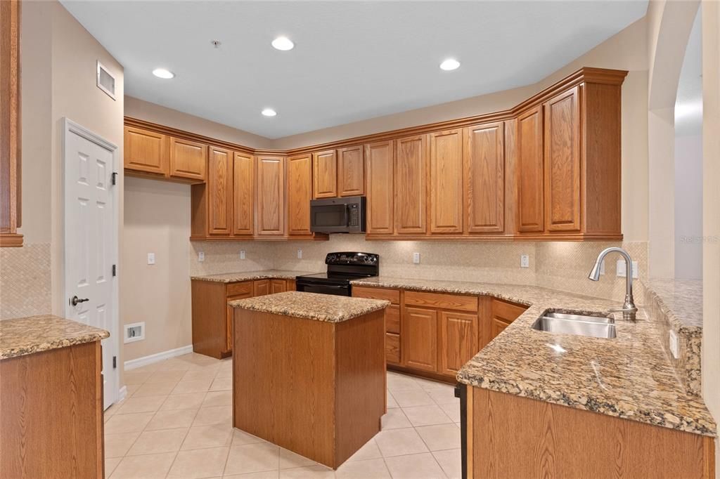 Kitchen with convenient Pantry, Range and Microwave