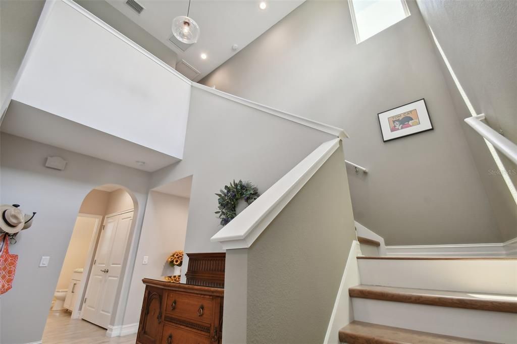 Stairs leading up to Bonus Room, and 2 bedrooms, and a full bath!